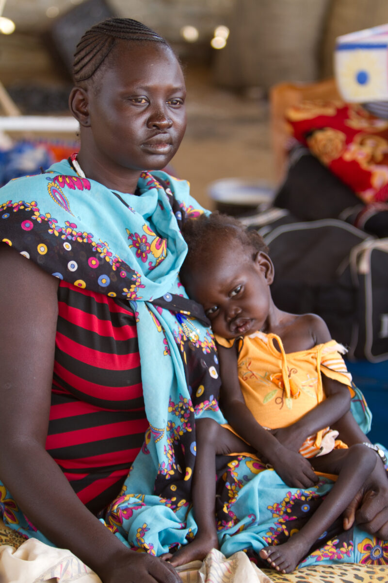 Refugees in Sudan — Mother and malnourished baby in a refugee camp in Sudan. — Africa, Sudan, faces, people, refugees