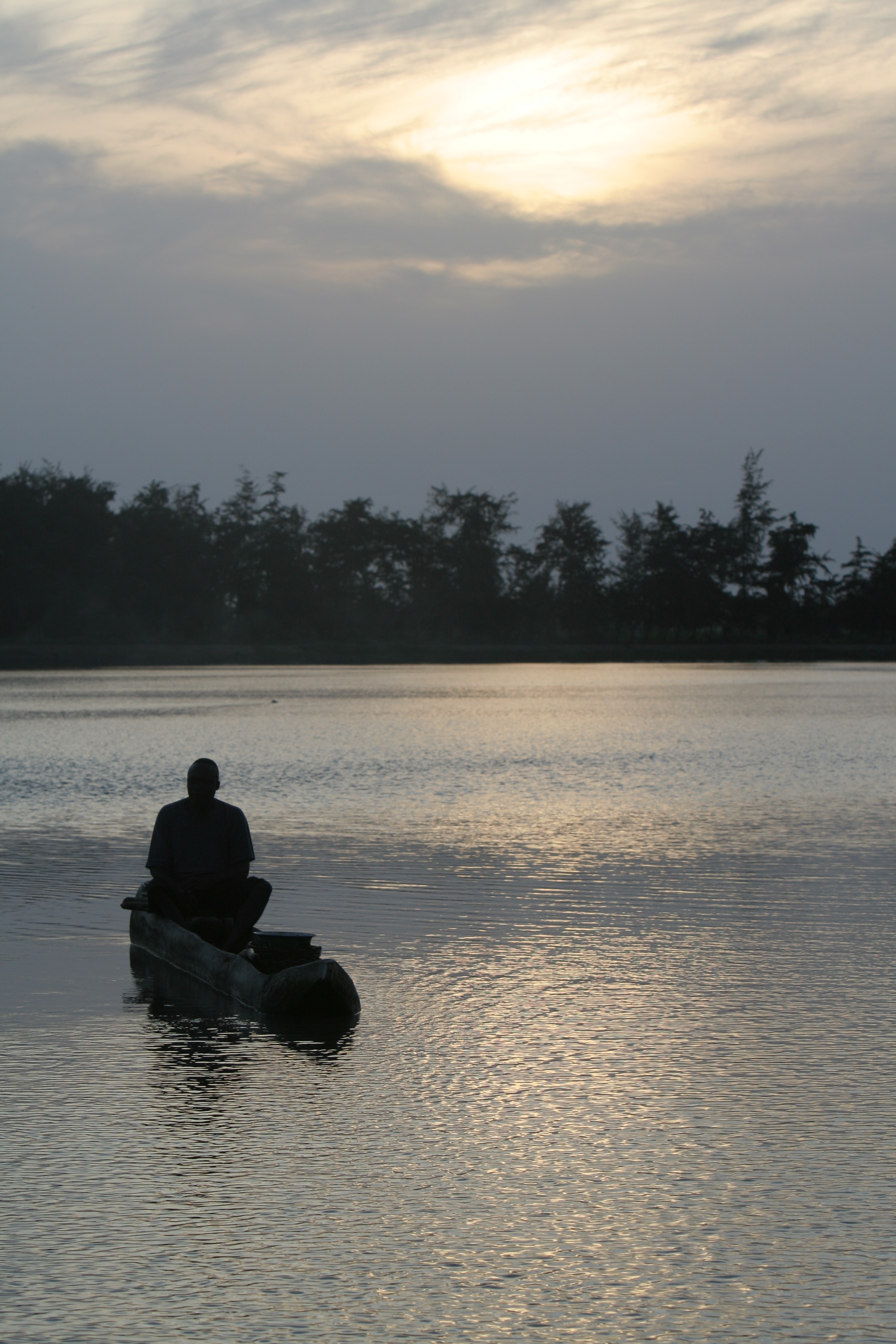 Man in Canoe in evening light