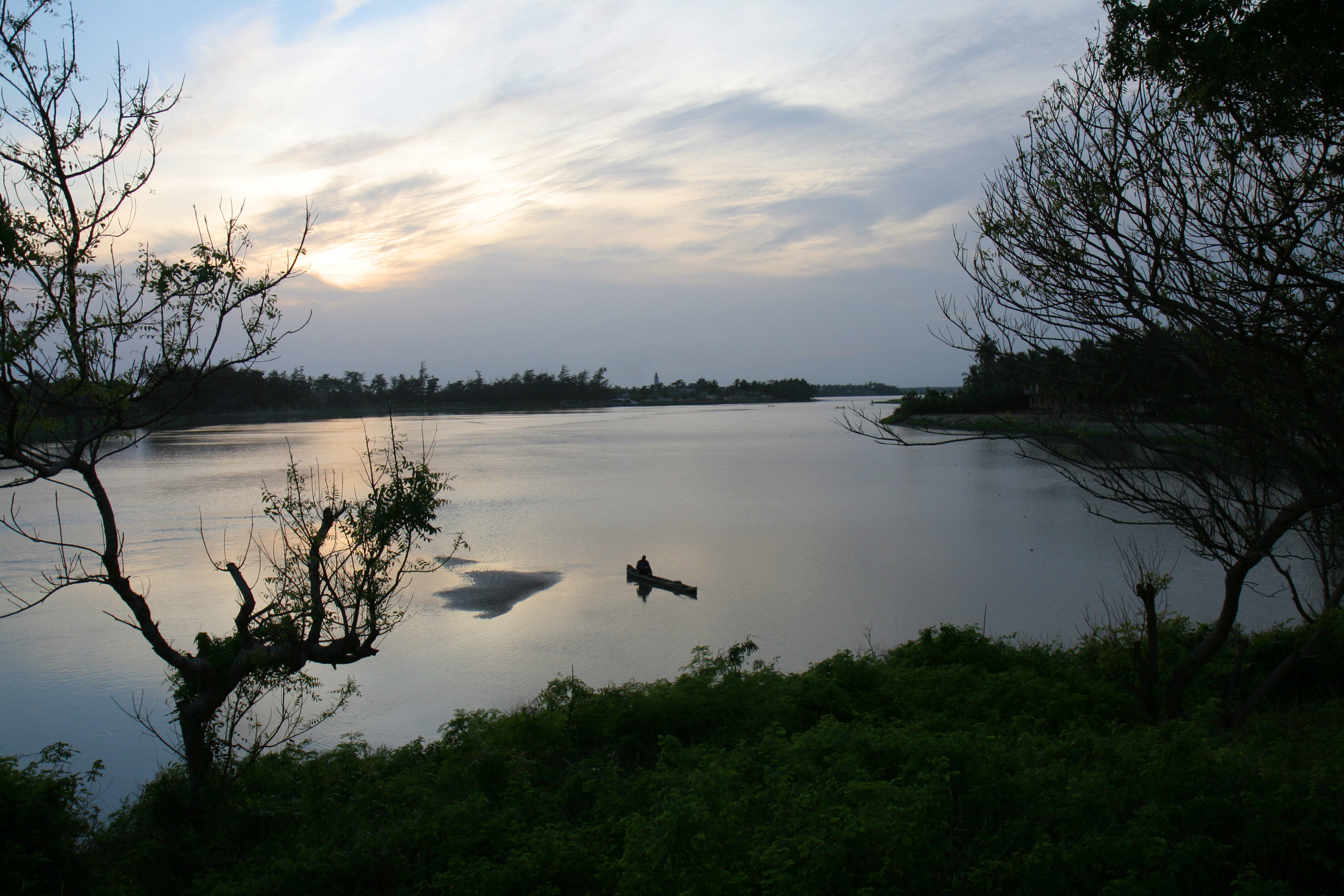 Man in Canoe in evening light