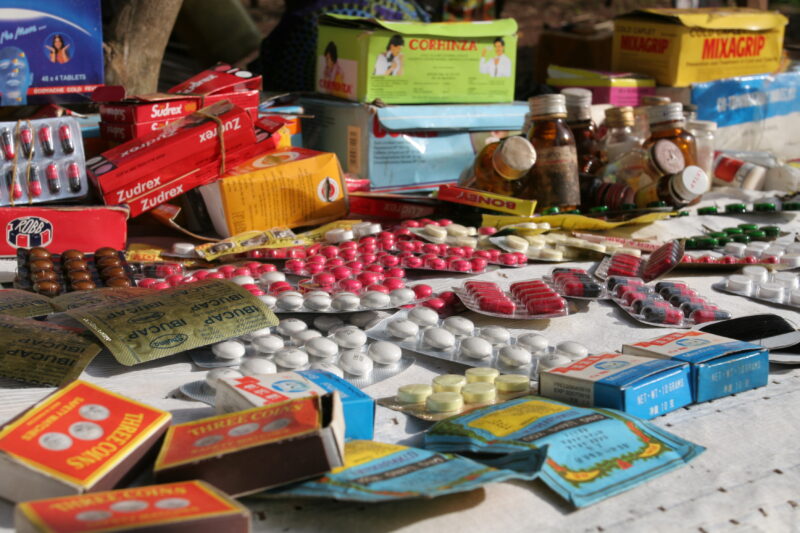 Drugs sold by person in Market — Togo, market, drugs, pills, pharmacuticals