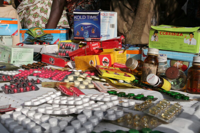 Drugs sold by person in Market — Togo, market, drugs, pills, pharmacuticals