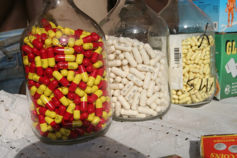 Drugs sold by person in Market — Togo, market, drugs, pills, pharmacuticals