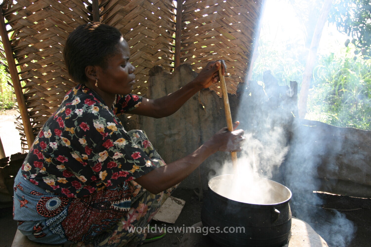 Cooking Food on open fire in Togo