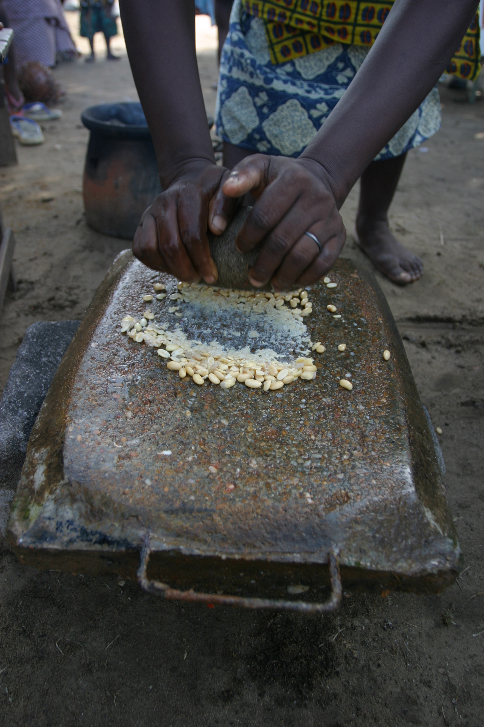 Grinding Maize on a Grinding Stone in Africa