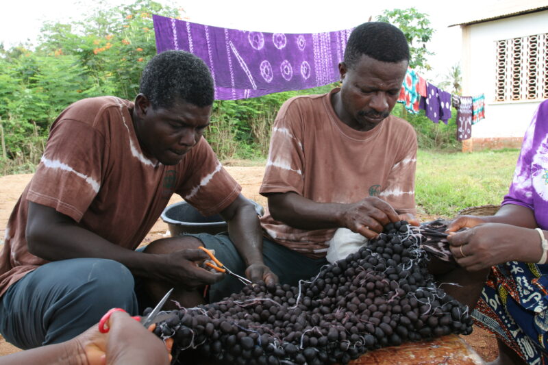 Tie Dye for Income — People in Togo learn how to do tie Dye to make income in West Africa — Togo, Africa, West Africa, men, faces