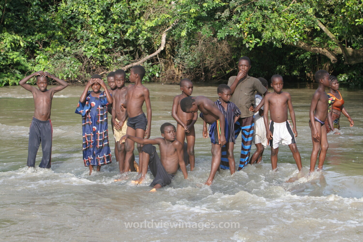 Doing Laundry in the River in Togo