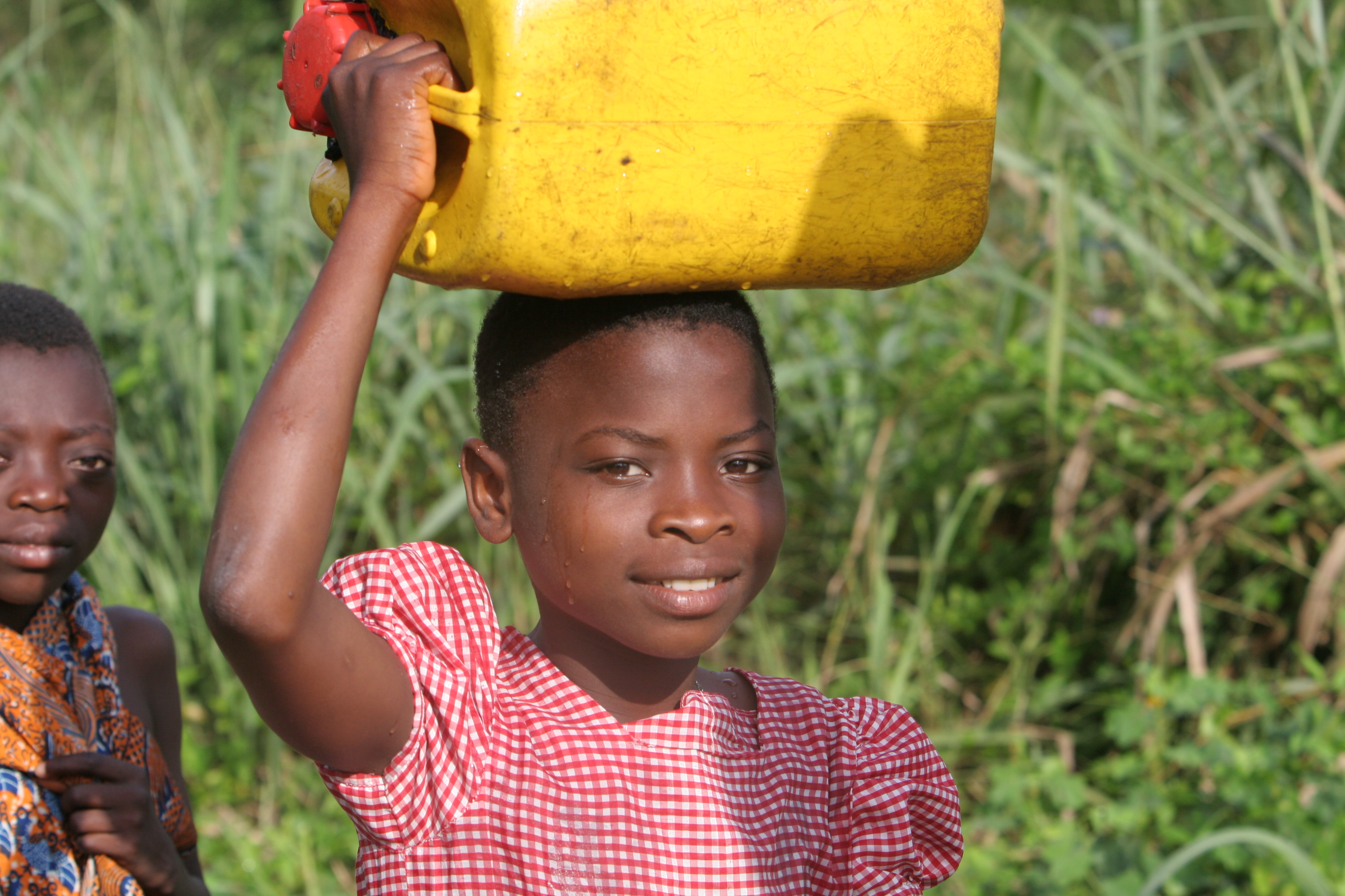 Doing Laundry in the River in Togo