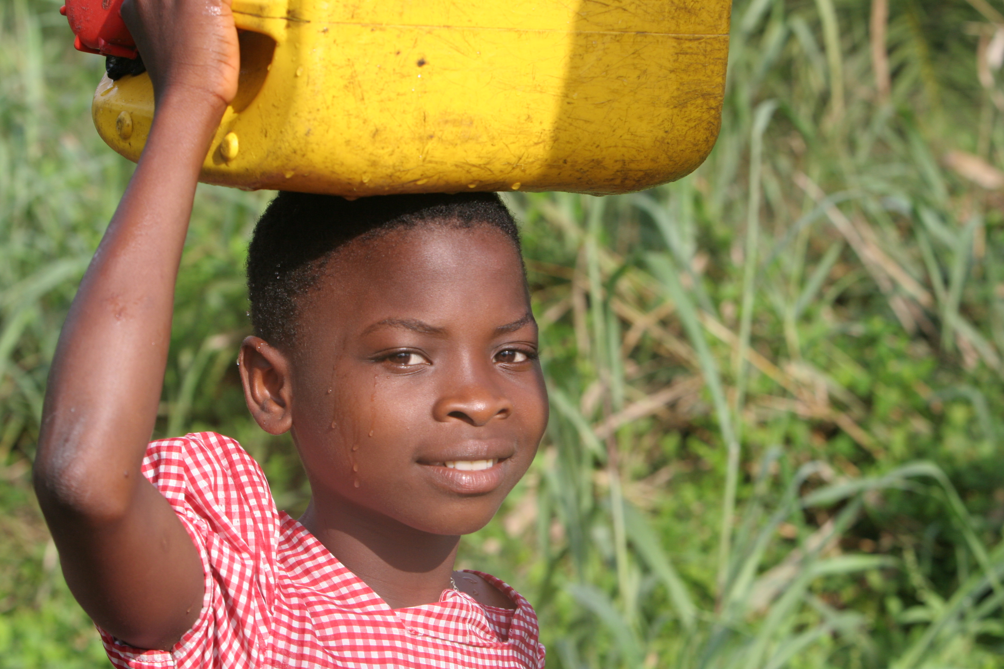 Doing Laundry in the River in Togo
