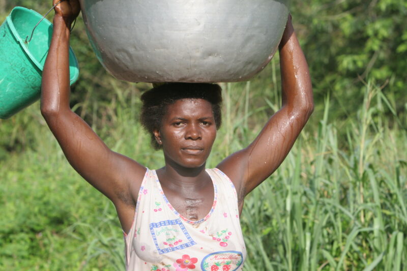 Doing Laundry in the River in Togo — Togo, Africa, West Africa, faces, women
