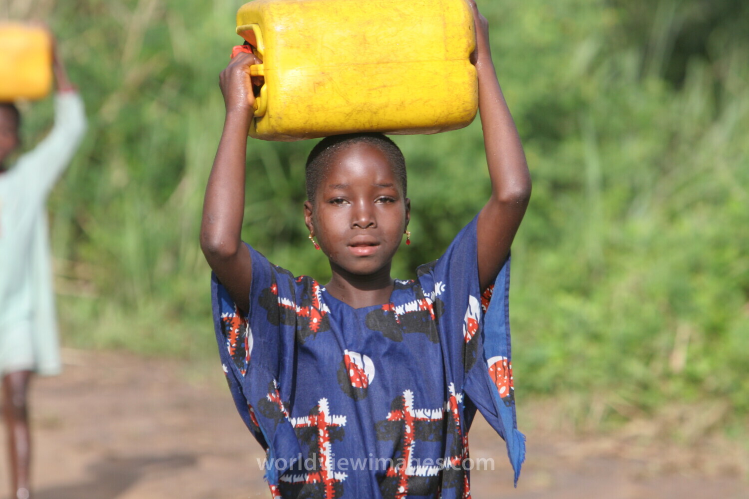 Doing Laundry in the River in Togo
