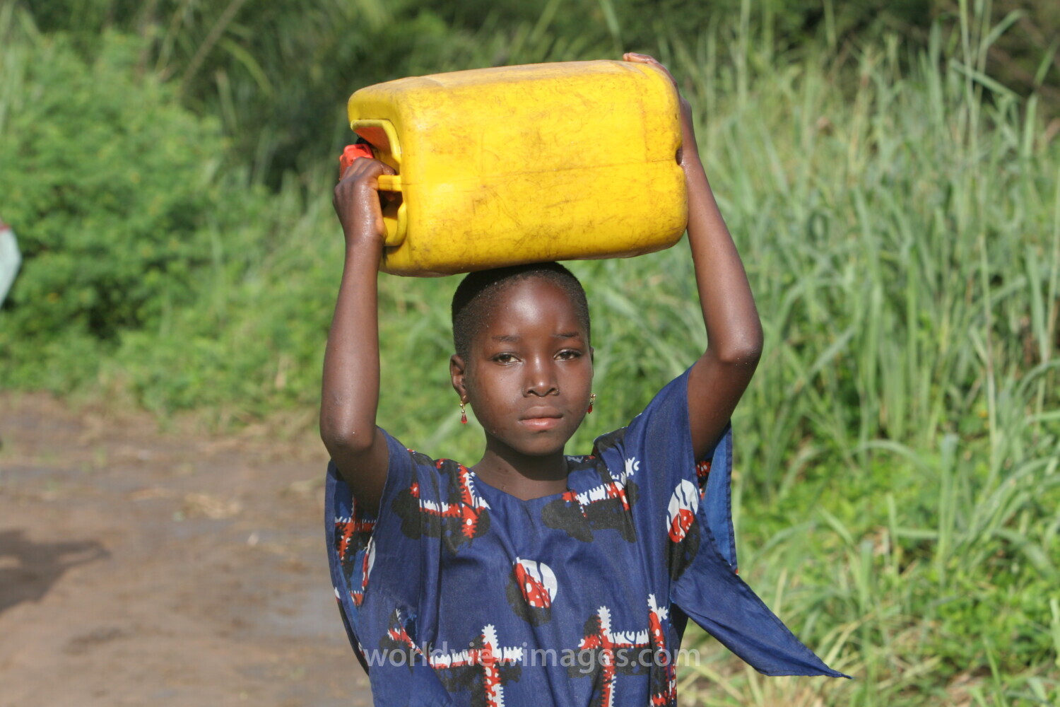 Doing Laundry in the River in Togo