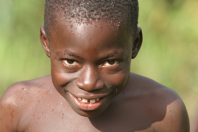 Doing Laundry in the River in Togo — Togo, Africa, West Africa, children, poor