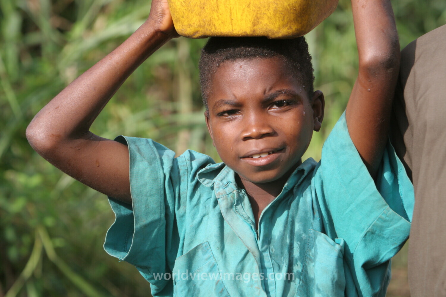 Doing Laundry in the River in Togo