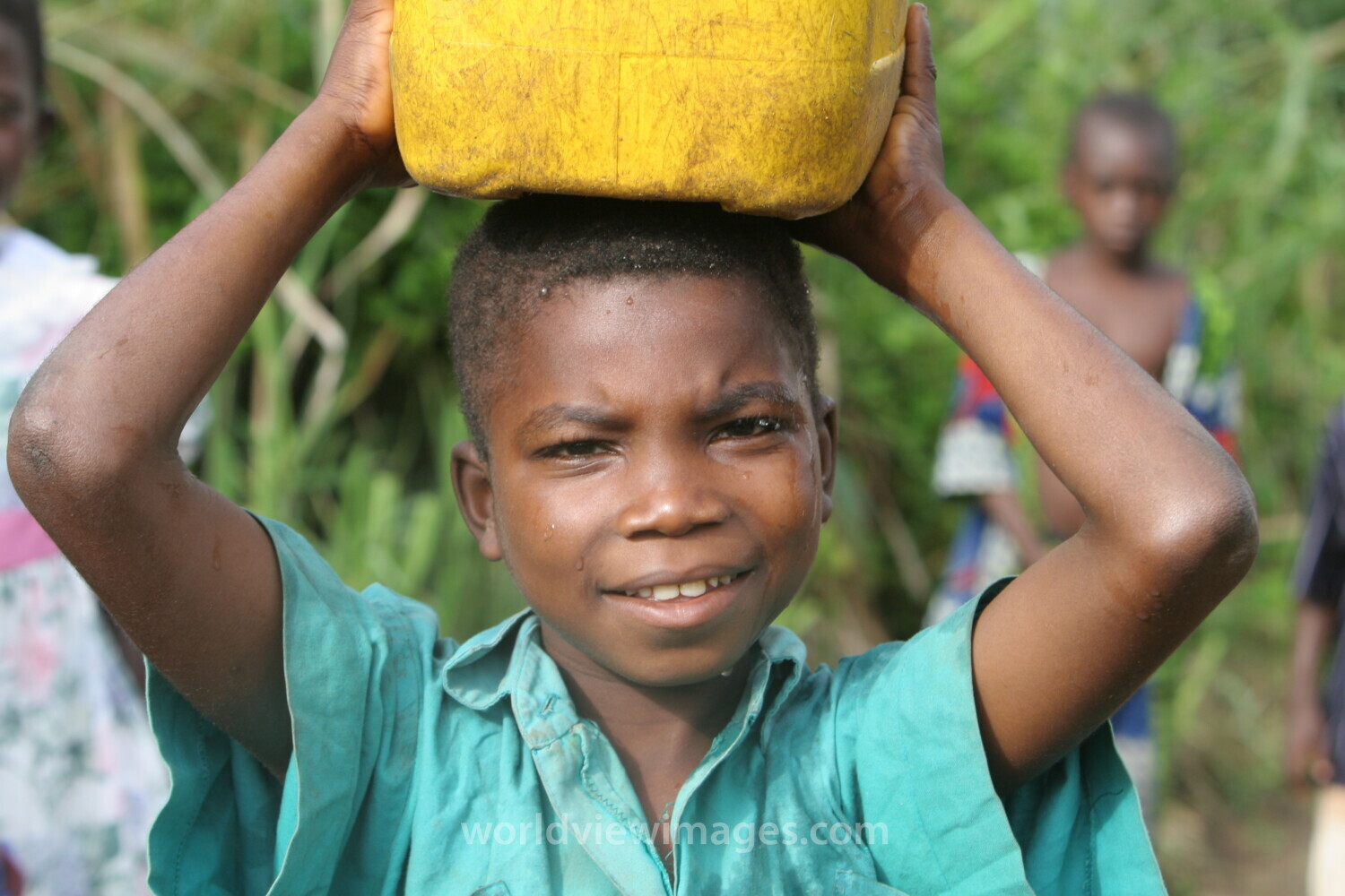 Doing Laundry in the River in Togo