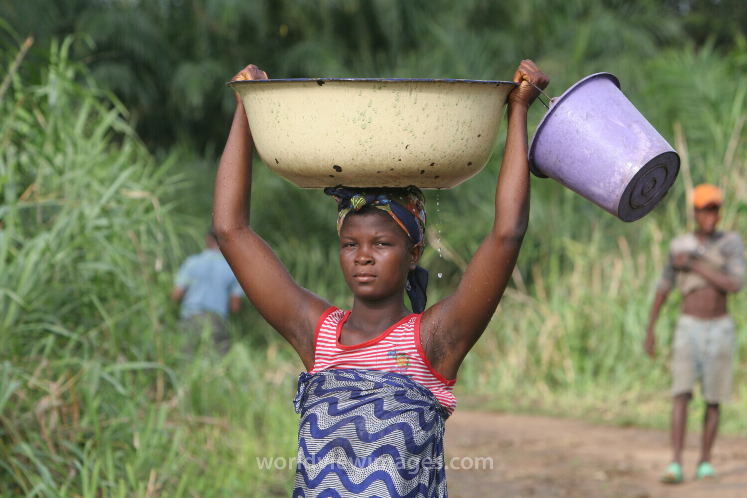 Doing Laundry in the River in Togo