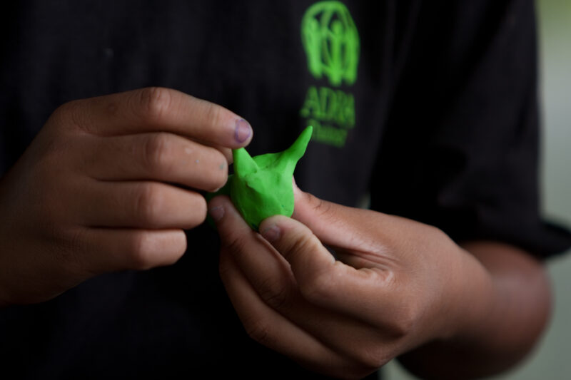 Art Therapy — Young girl in a ADRA program works on a craft — Thailand, ADRA, girl, craft
