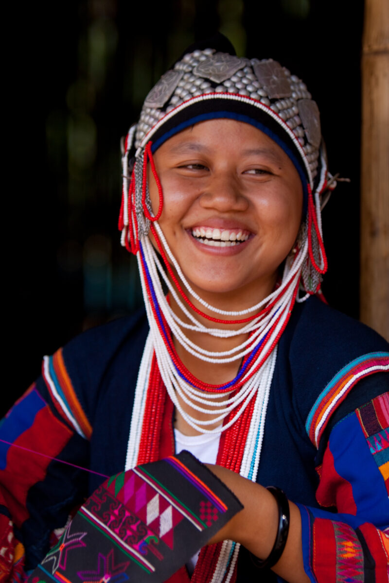 Ethnic Girl in Thailand — Ethnic minority girl in doorway of her home in Northern Thailand — Thailand, girl, ethnic minority, hill tribe, dress