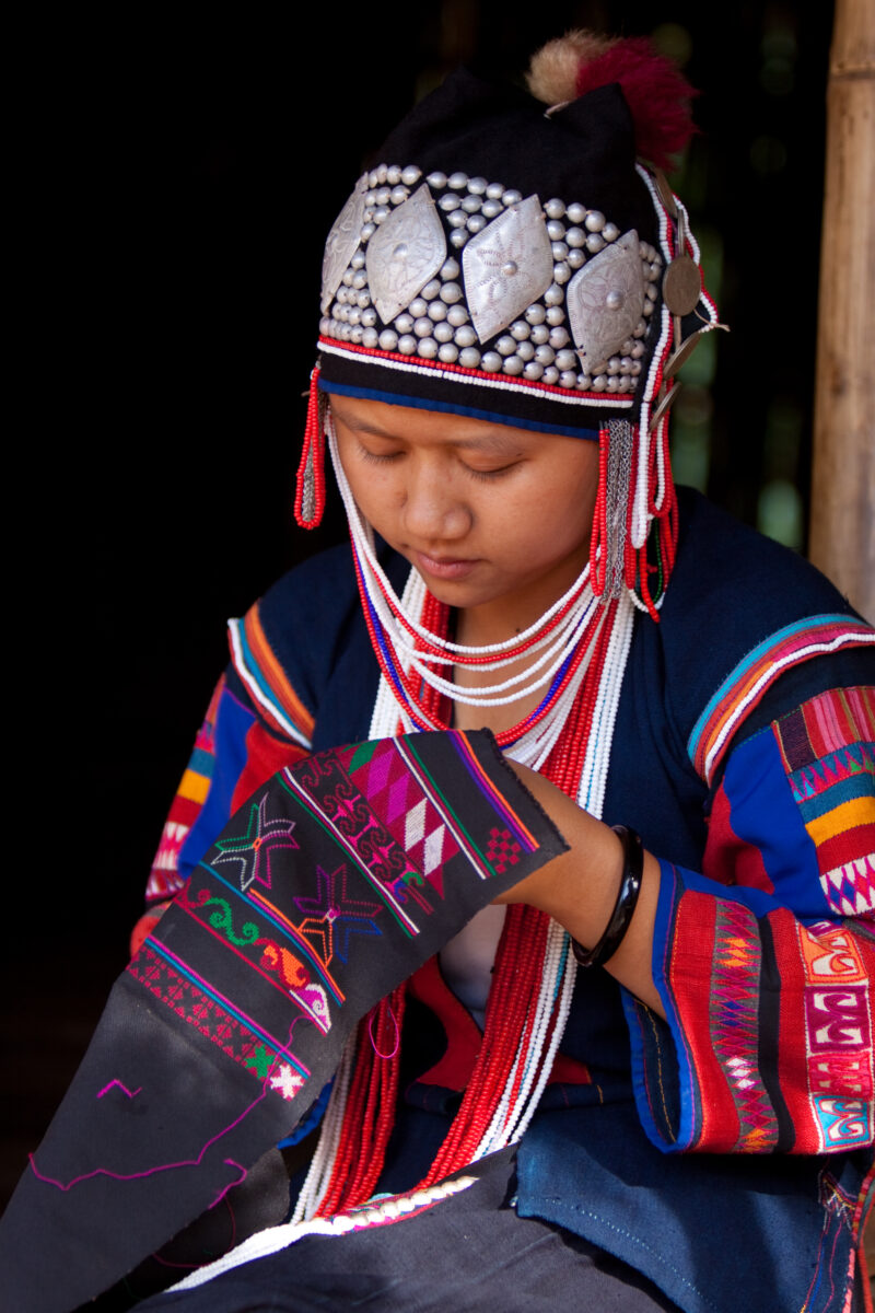 Ethnic Girl in Thailand — Ethnic minority girl in doorway of her home in Northern Thailand — Thailand, girl, ethnic minority, hill tribe, dress