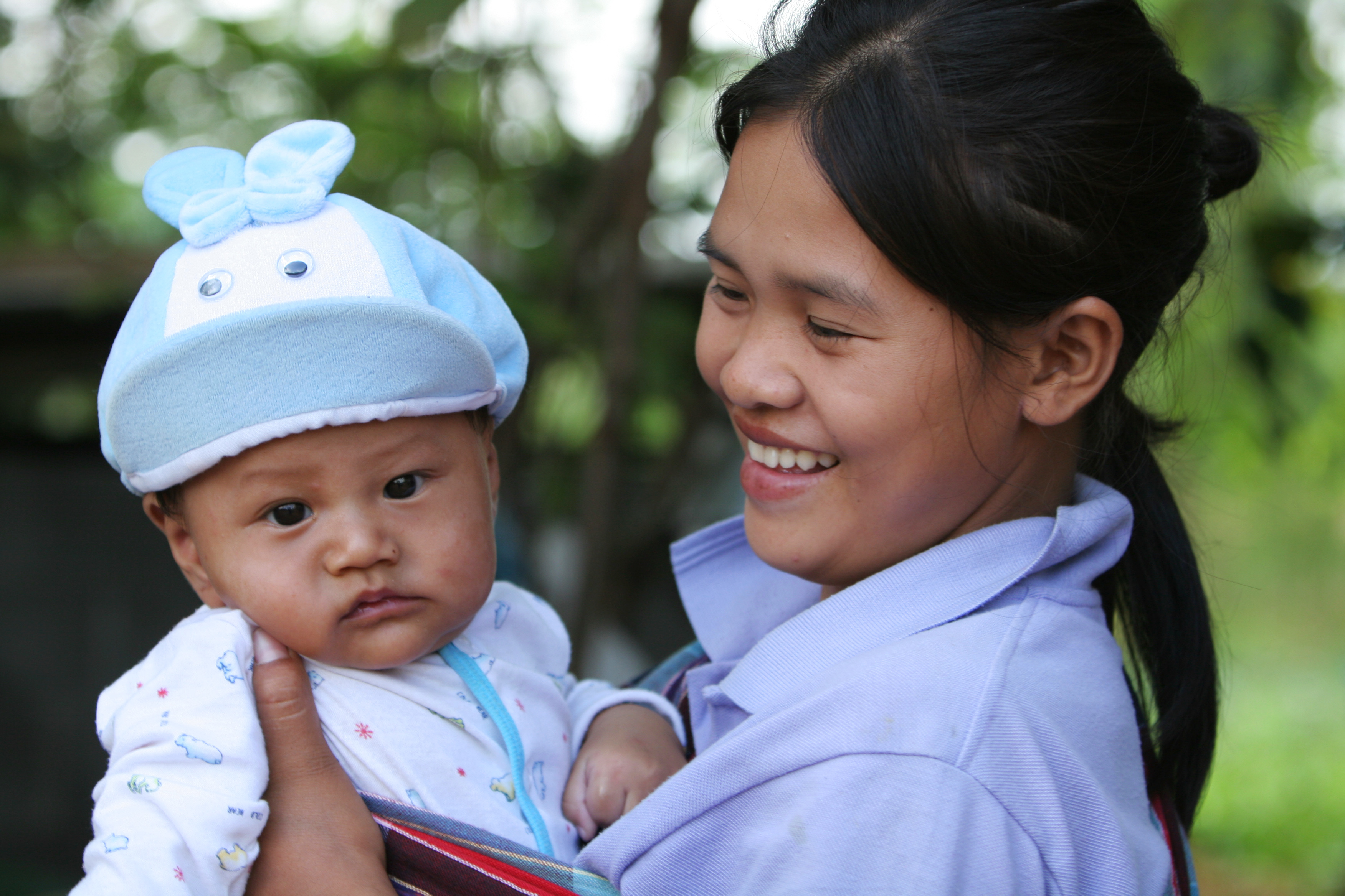 Girl and Baby Sister in Thailand