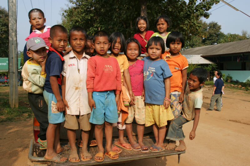 Children Ready to Ride — Children get a ride back to their vilage in the back of a pickup truck, after school — Thailand, children, truck