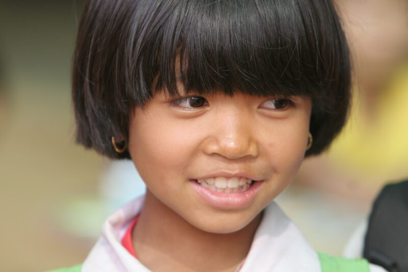 Girl in Thailand — School girls out at recess time at their school in Rural Thailand — Thailand, child, children, girls, smile