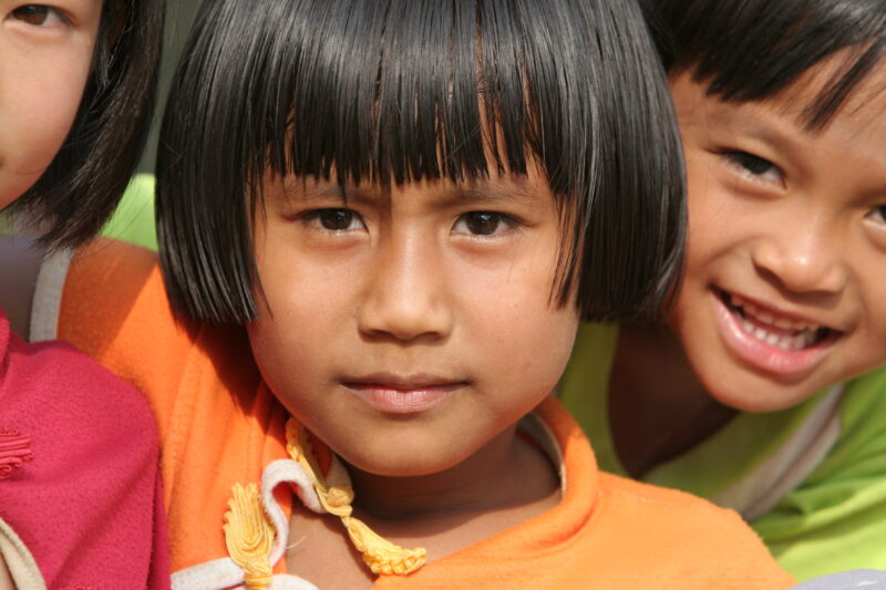 Girl in Thailand — School girls out at recess time at their school in Rural Thailand — Thailand, child, children, girls, smile
