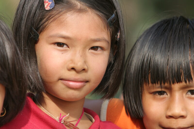 Girl in Thailand — School girls out at recess time at their school in Rural Thailand — Thailand, child, children, girls, smile