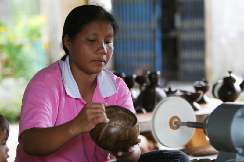 Making Containers from Coconut Shells — Woman makes money by turning coconut shells into art, for tourist souvenirs. — Thailand, women, craft, crafts, coconut