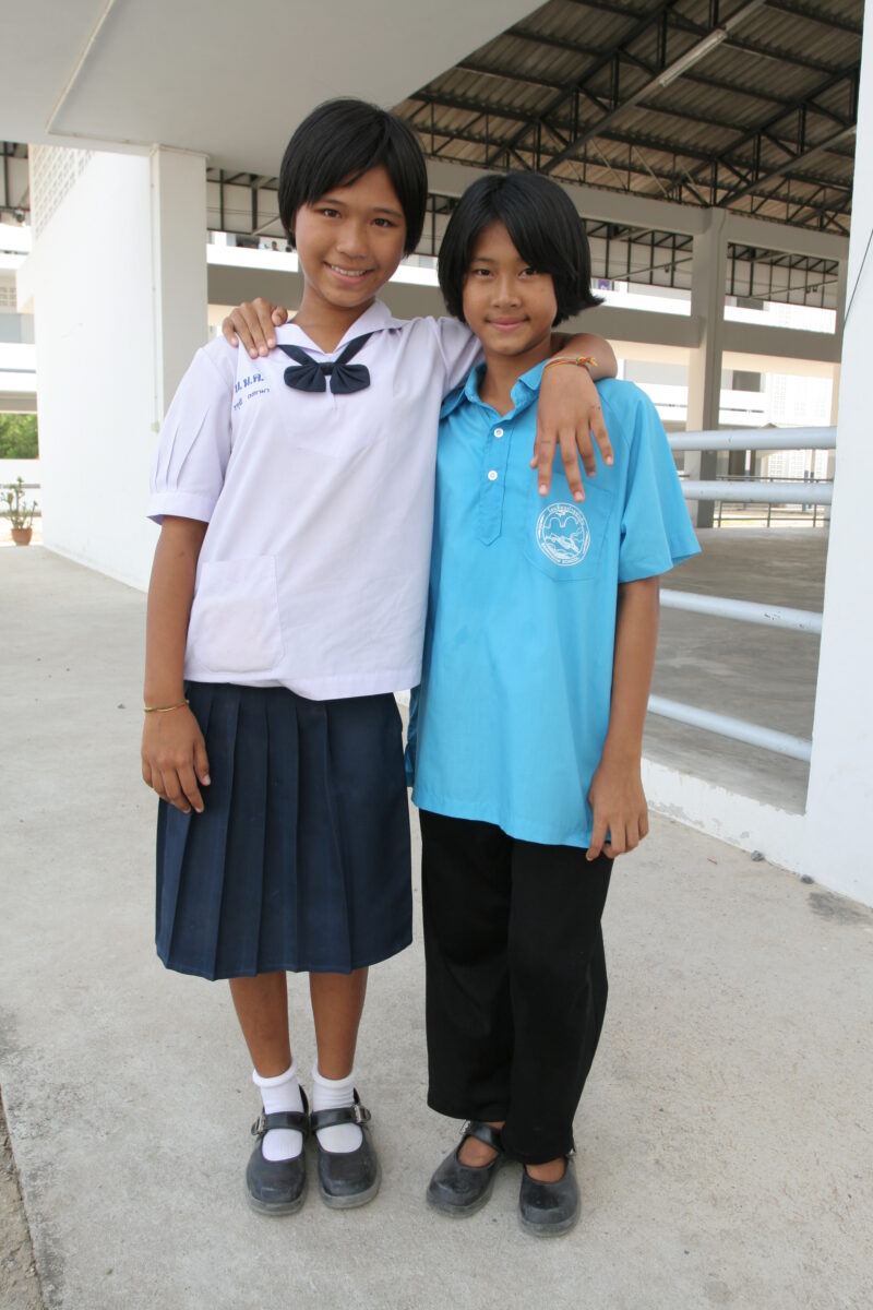 Best Friends — School girls outside their classroom in Phuket, Thailand. — Thailand, girls, faces, Phuket, students