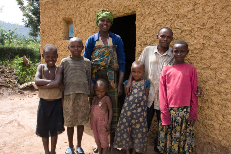 Family Group in Rwanda — Family of returning refugees pose by a house in a community supported by International deveopment, ADRA and the Canadian Government....
