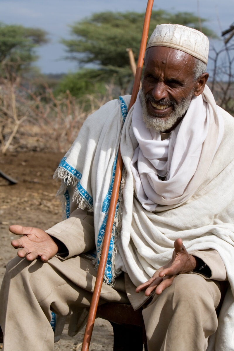 Elder Muslim Man in Ethiopia — Elderly Ethiopian Muslim man smiles in the early morning light — Etheopia, Ethiopia, Poverty, Africa, man