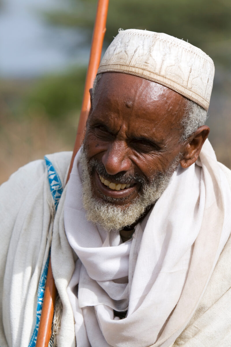 Elder Muslim Man in Ethiopia — Elderly Ethiopian Muslim man smiles in the early morning light — Etheopia, Ethiopia, Poverty, Africa, man