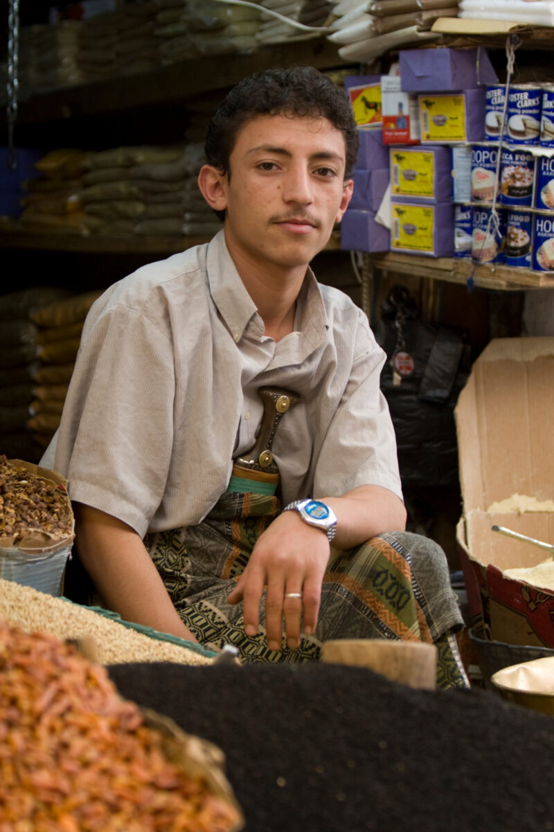 Young Man in a Market in Yemen — Stock images of people in Yemen — Yemen, people, men, faces