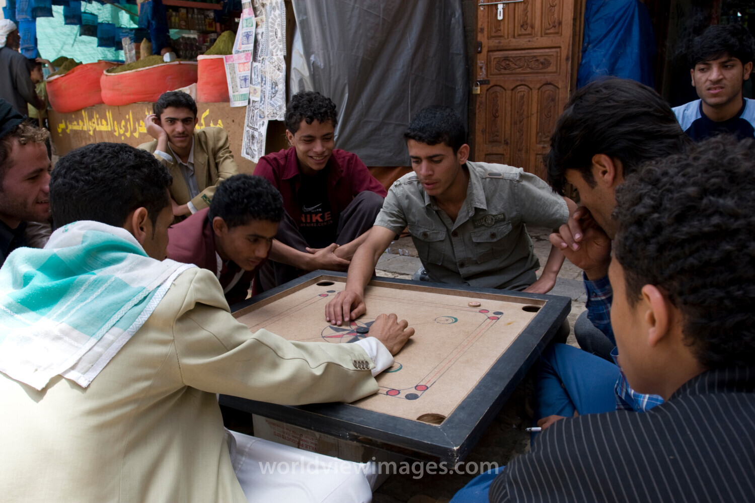 Boys Play a Game in the Market