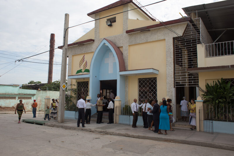 Adventist Church in Cuba — People gather outside a church in Cuba — Cuba, church, churches, Adventis, Seventh-day Adventist