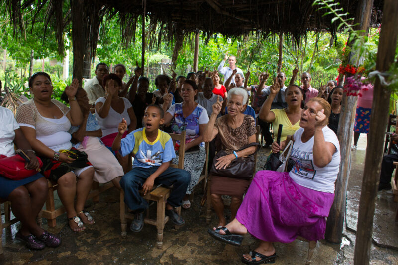 Church Gathering — Christians gather to praise and worship in a temporary church made of Bamboo and leaves, in Cuba — Cuba, Church, Christian, group, people