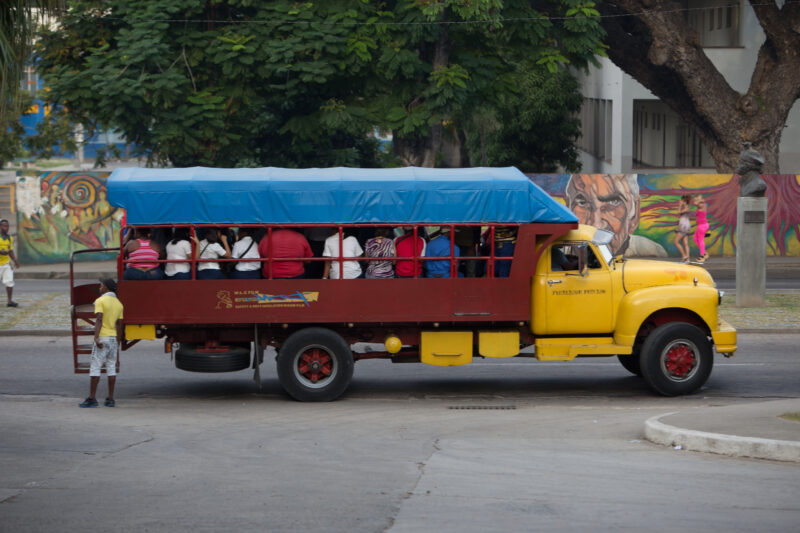 Cuba Transportation — Trucks with seats in the back provide public transportation in many rural areas of Cuba — Cuba, bus, truck, transportation, Public tran...