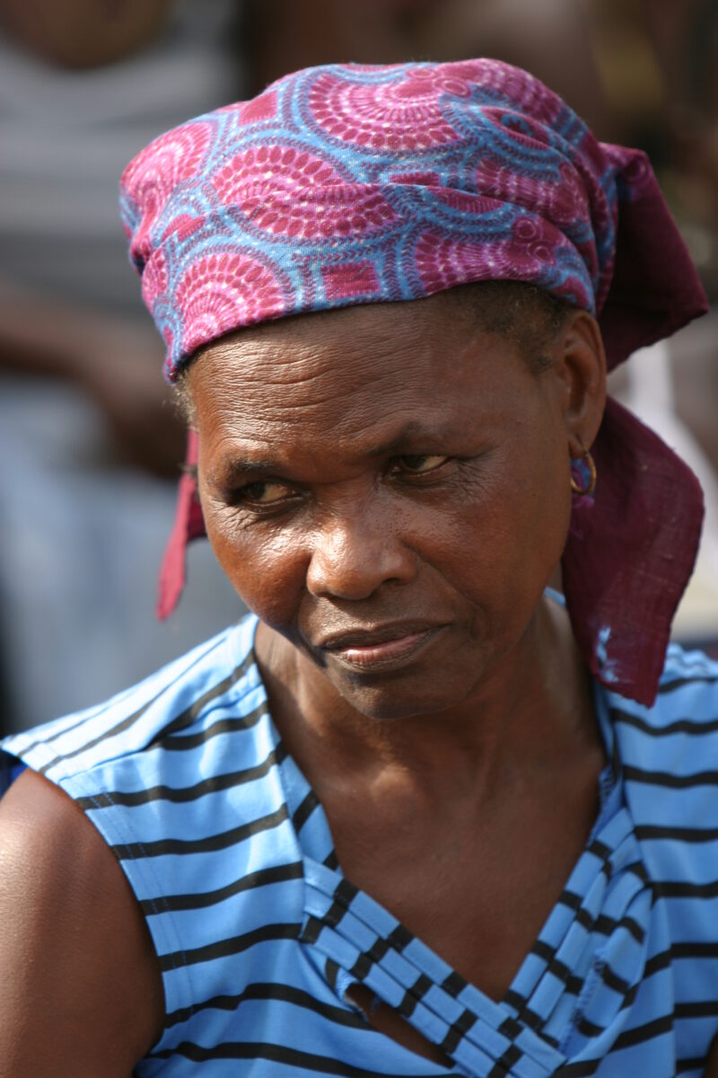 Woman in Sao Tome — Listening to a Health and Wellness seminar held in their village by ADRA — Sao Tome, Africa, Women, woman, people