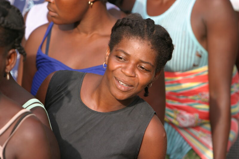 Woman in Sao Tome — Listening to a Health and Wellness seminar held in their village by ADRA — Sao Tome, Africa, Women, woman, people