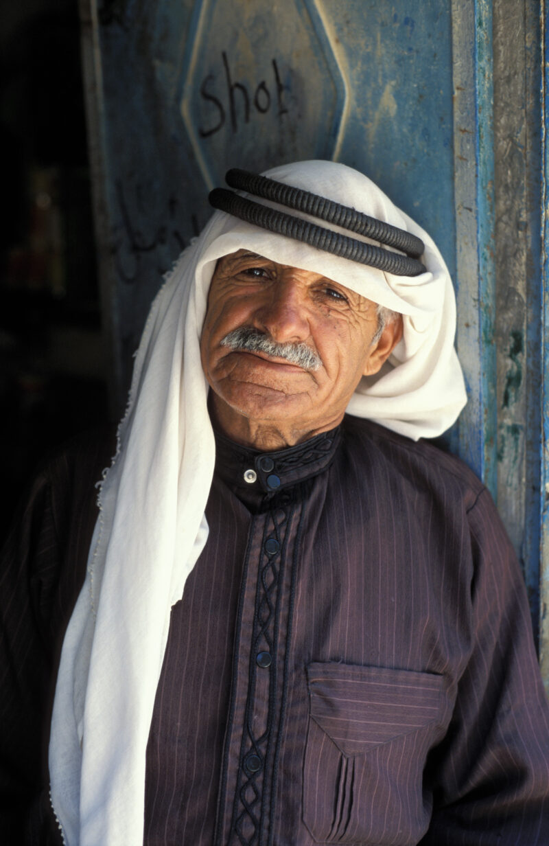 Welcome to my Shop — Stock Images of the people of Jordan: Man in the doorway of his "shob" at the out of the way tourist destination of Dana, Jordan. — Jord...