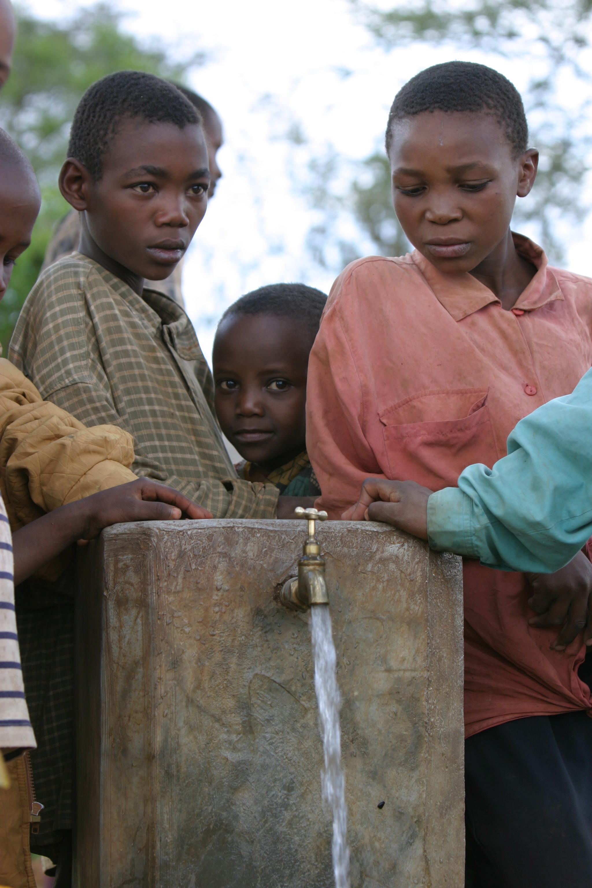 At the Water Tap in Tanzania