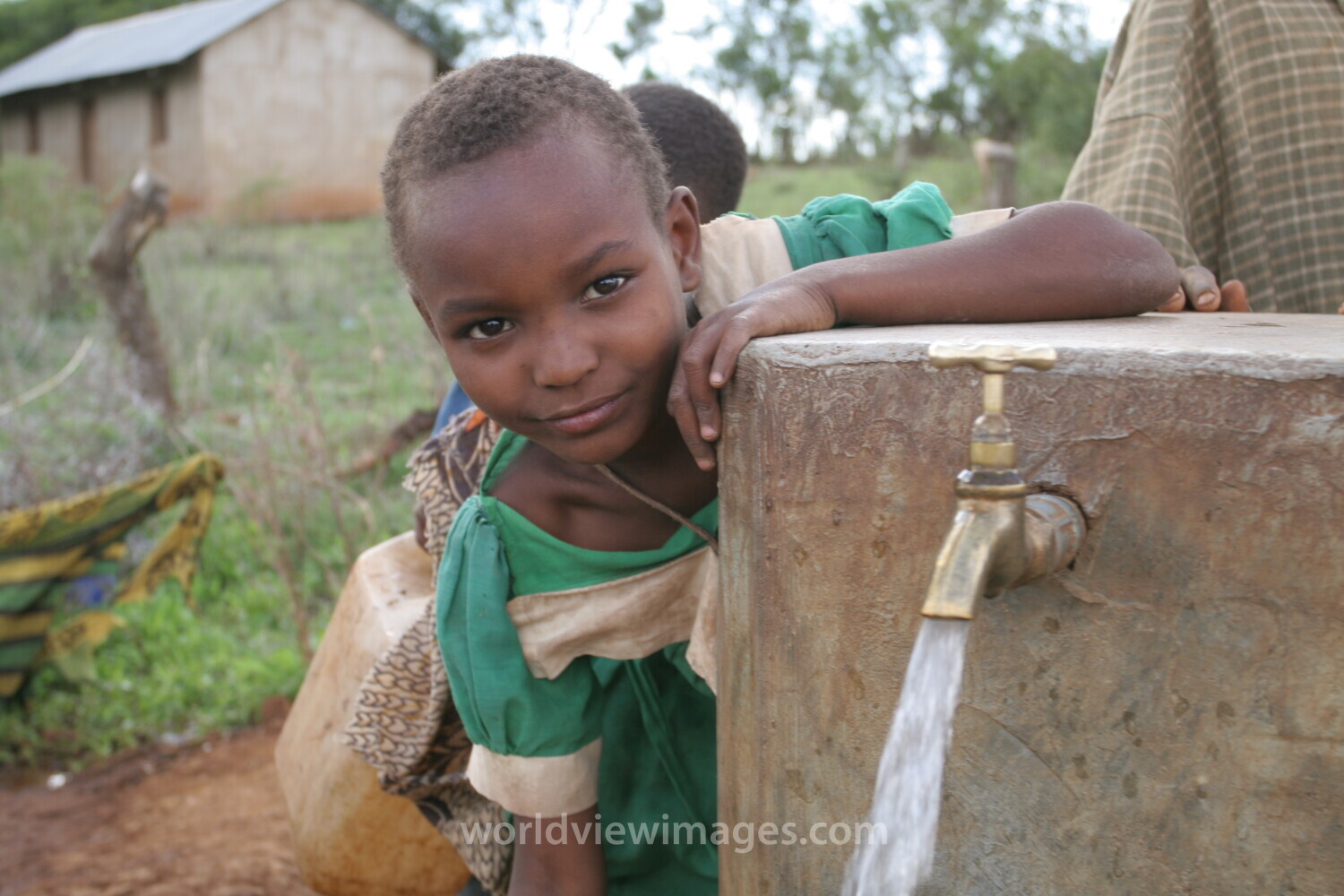 At the Water Tap in Tanzania