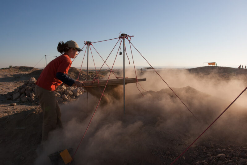 Sifting for Treasure — Students and Local workers, hired for the dig session, sift through the dirt that comes out of the squares, to catch small items like ...