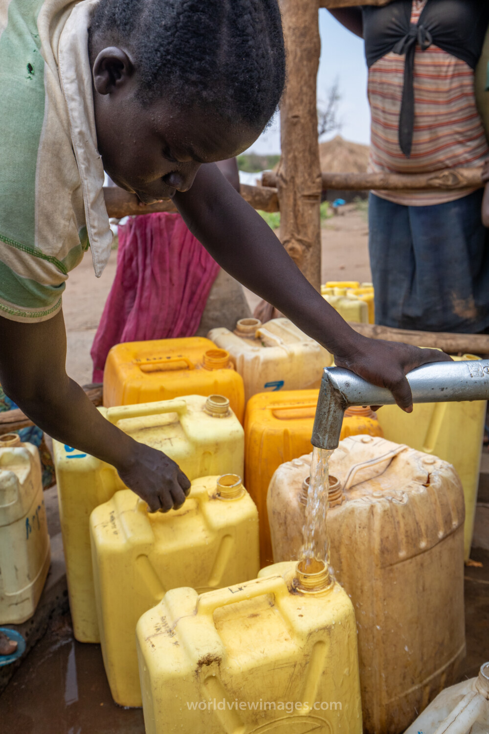 Collecting Water in the Refugee Settlement