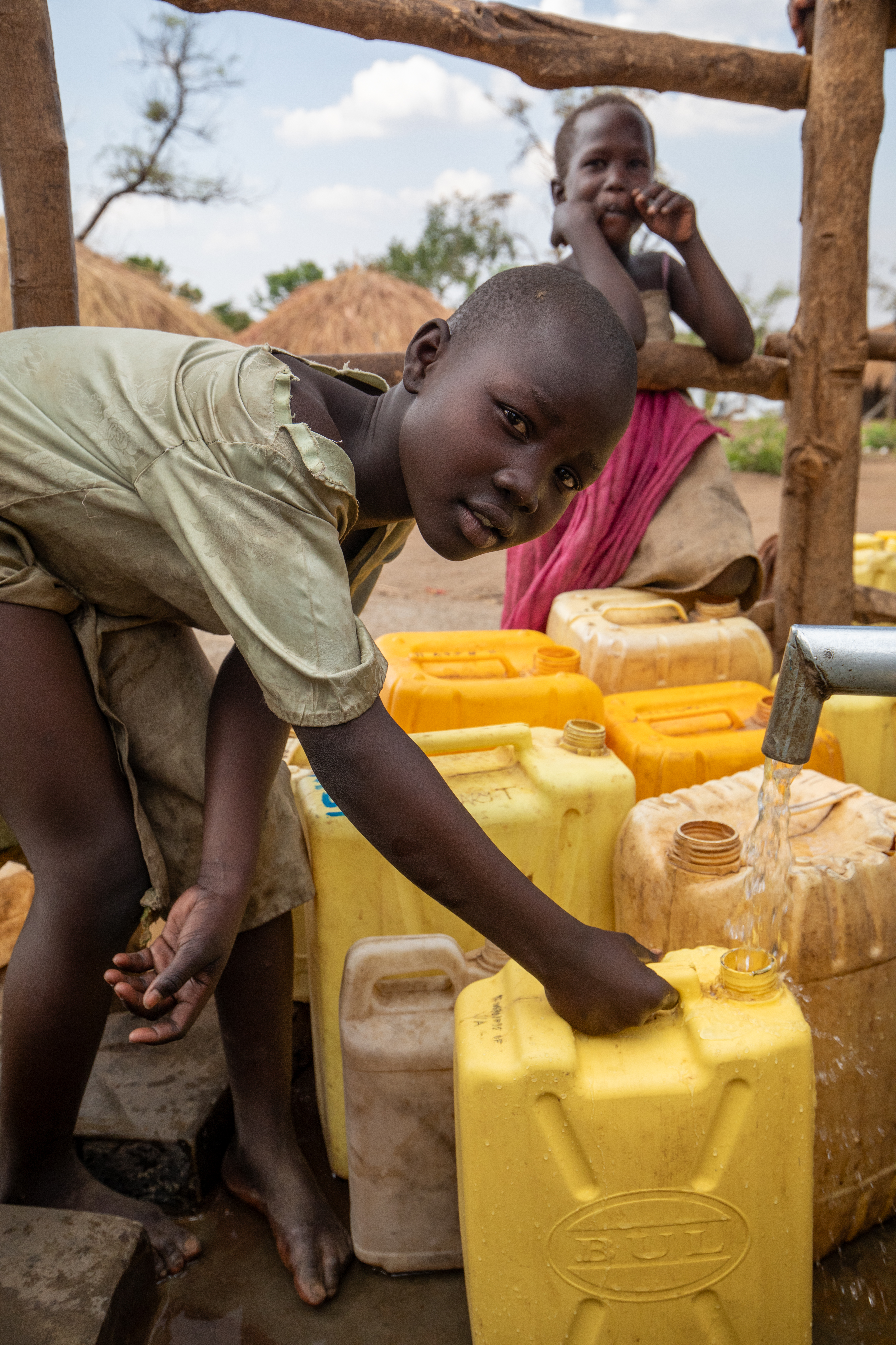 Collecting Water in the Refugee Settlement