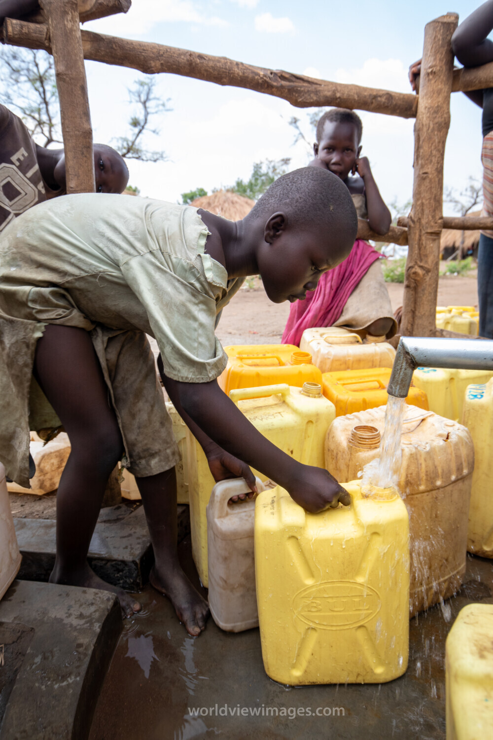 Collecting Water in the Refugee Settlement