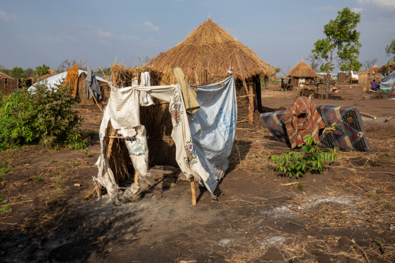Refugee Housing — Refugees from South Sudan given a small plot of land in their host country of Uganda to build a small house. — Refugee, Refugee Settlement,...