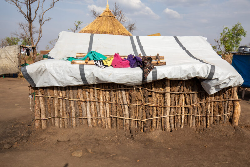 Refugee Housing — Refugees from South Sudan given a small plot of land in their host country of Uganda to build a small house. — Refugee, Refugee Settlement,...