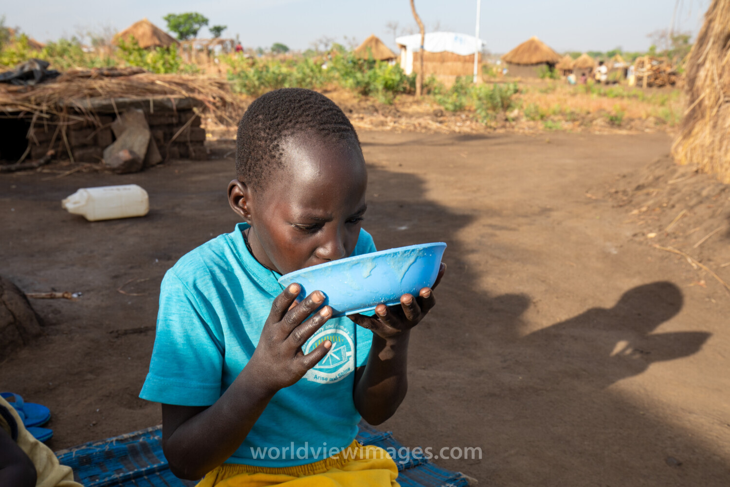 Refugee Child Eating