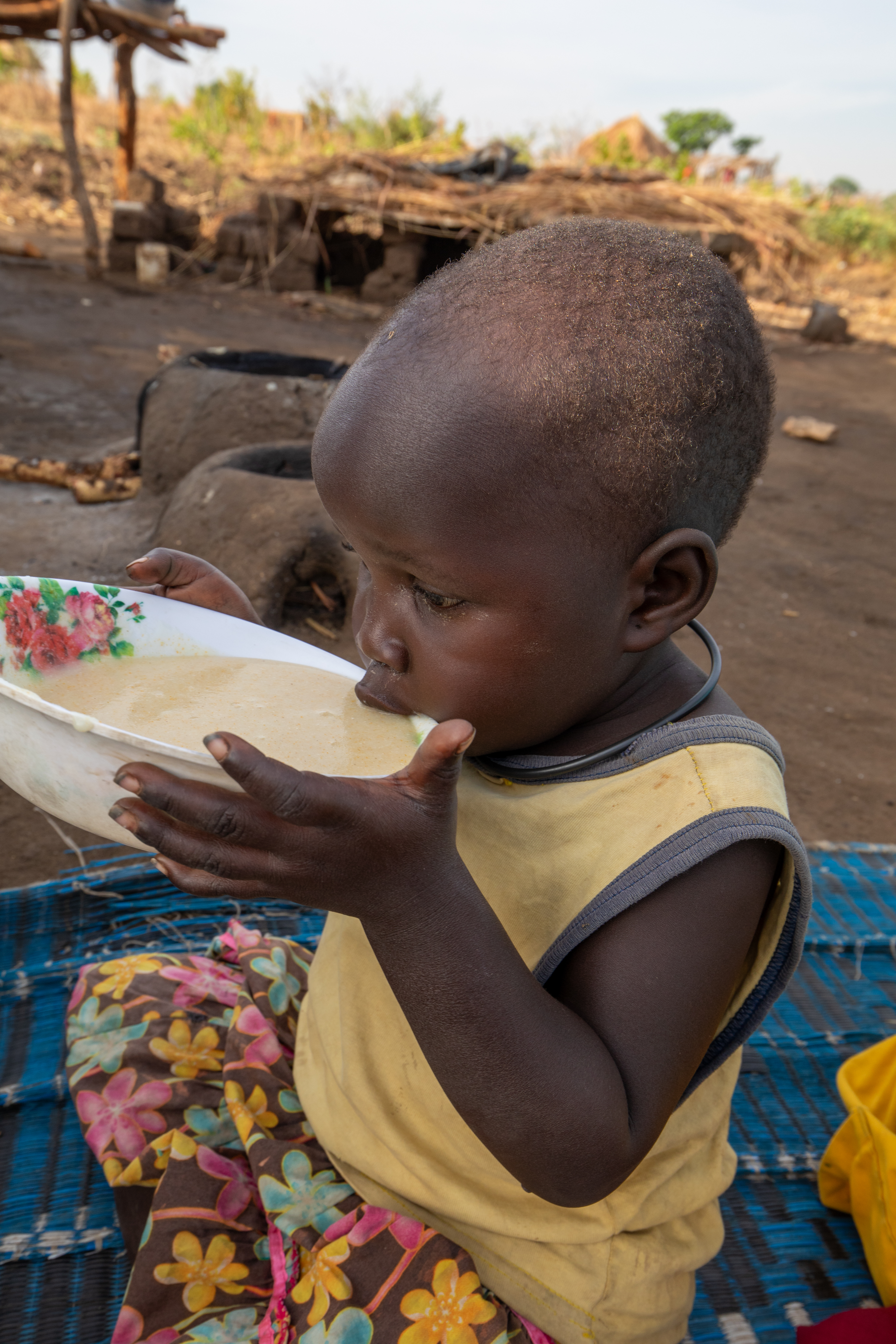 Refugee Child Eating